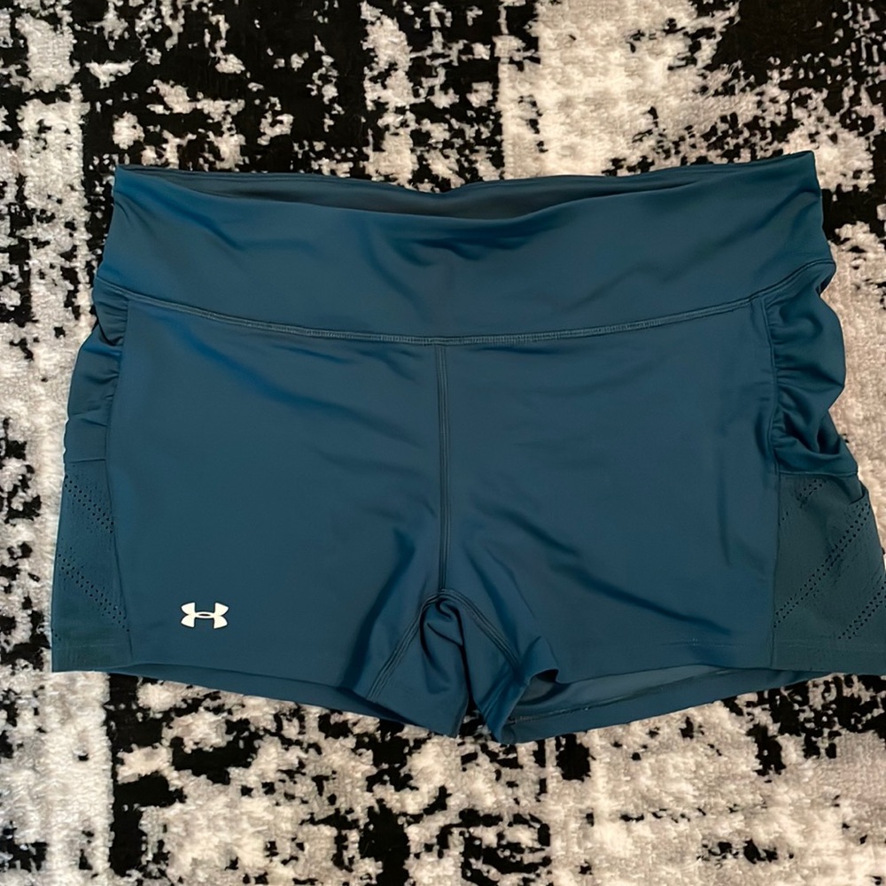 Under Armour teal athletic shorts.  Worn only a few times.  Great condition!